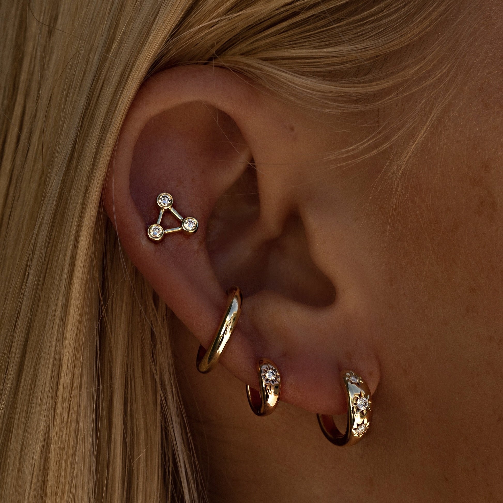 Three Star Set Rounded Diamond Huggies by Logan Hollowell Jewelry